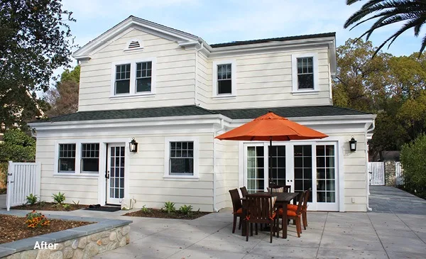 Pitzer Project by HartmanBaldwin - Hartman Baldwin After image of exterior of home with cream walls and white trim.