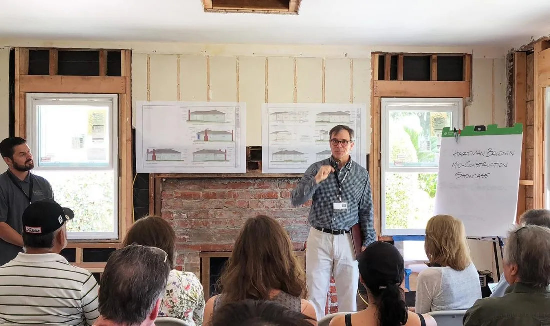 HartmanBaldwin Project Presentation - Hartman Baldwin HartmanBaldwin staff showing plans for a new project.