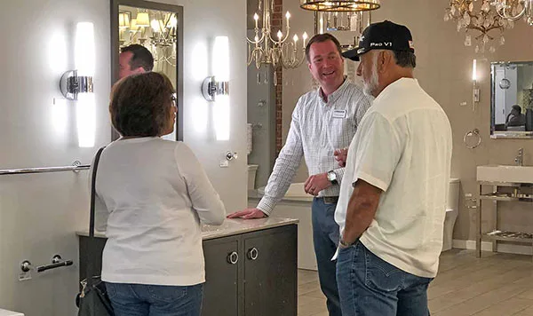 HartmanBaldwin staff and potential clients in showroom.