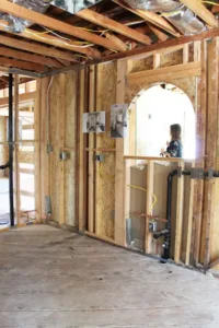 HartmanBaldwin Project Presentation - Hartman Baldwin HartmanBaldwin staff presenting new project inside with exposed framing.