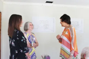 HartmanBaldwin staff presenting new project inside.