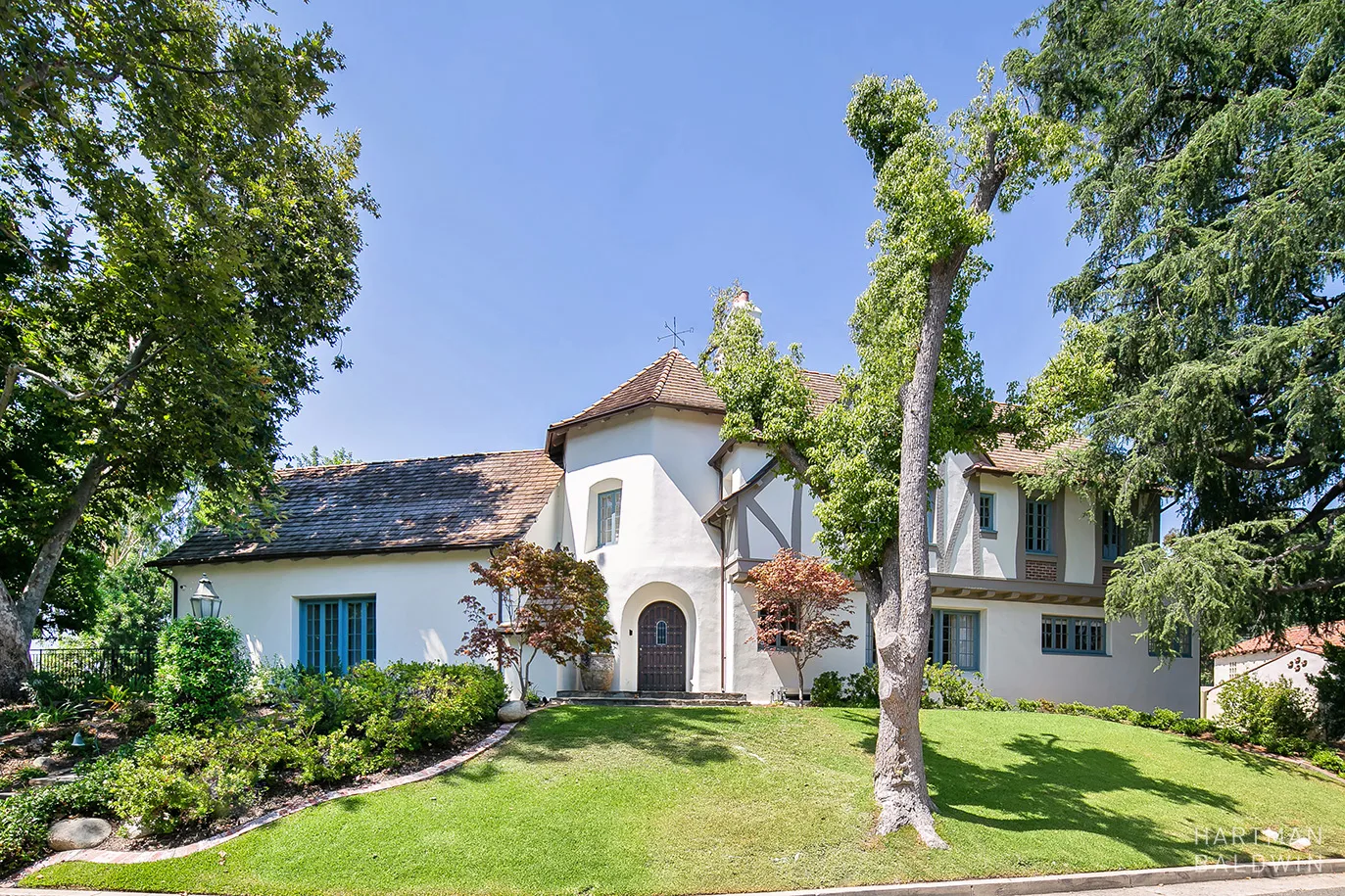 Front Exterior of French Normandy Estate Renovation