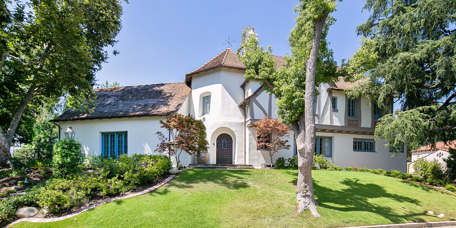 Front Exterior of French Normandy Estate Renovation