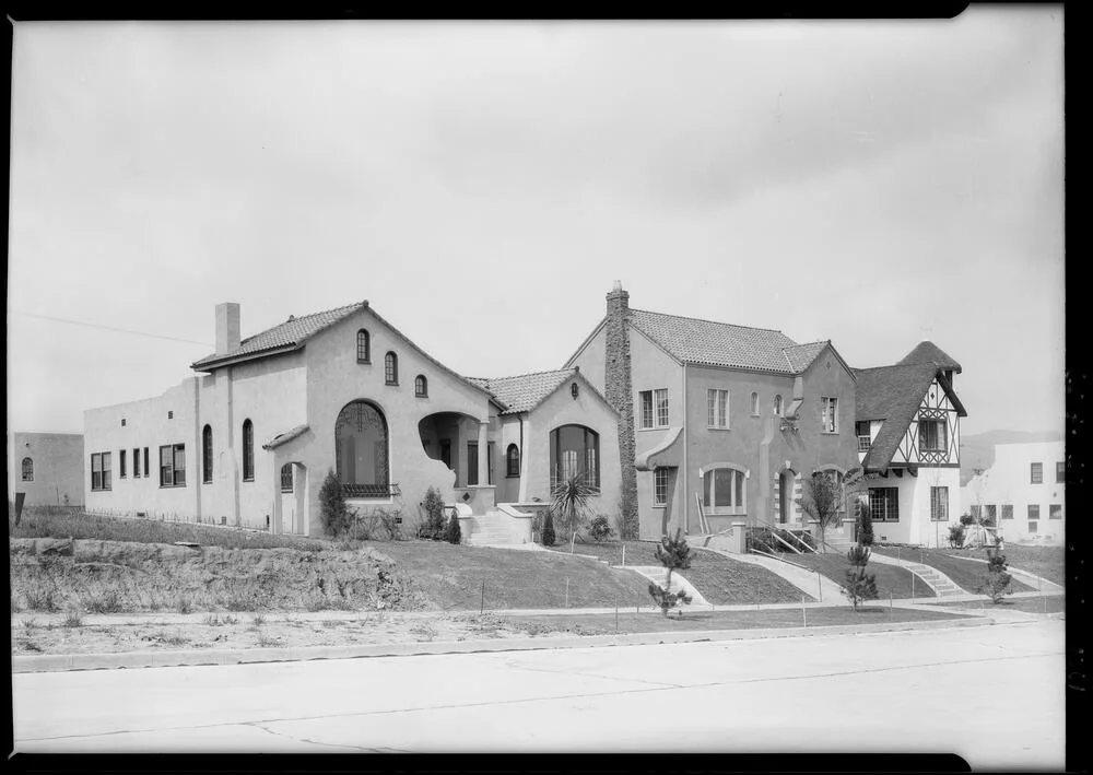 Vintage photograph of various revival style homes in a Beverly Hills neighborhood