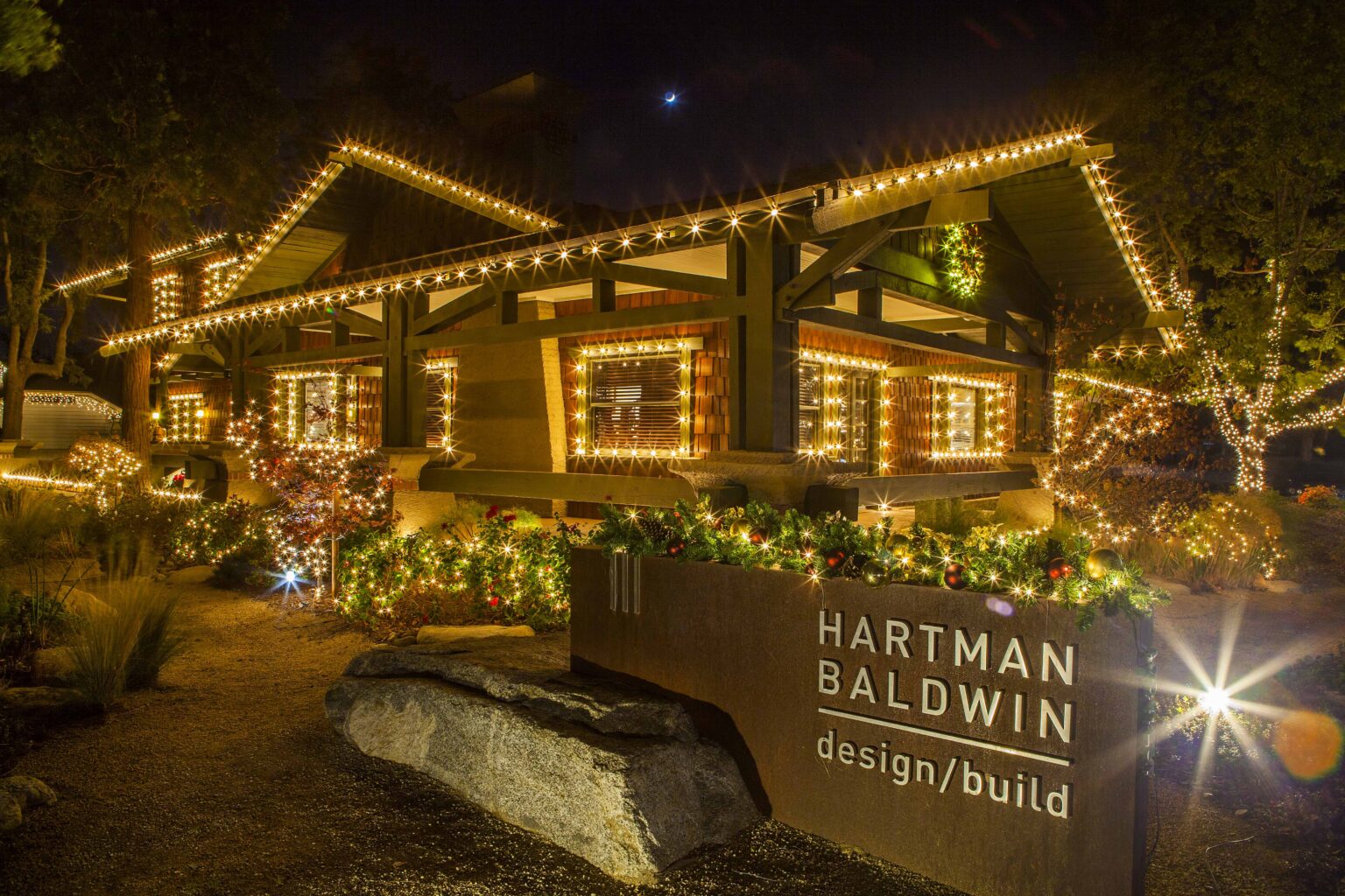 HartmanBaldwin's Claremont office at night with Christmas lights
